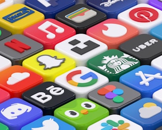 A vibrant grid of popular gaming app icons glowing with bright gradients.